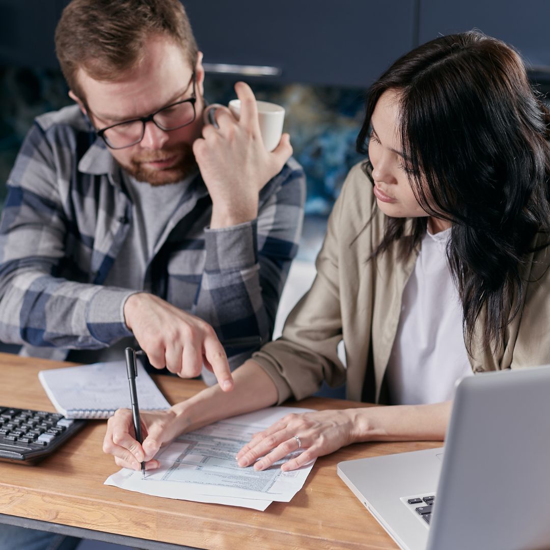 couple looking at bills